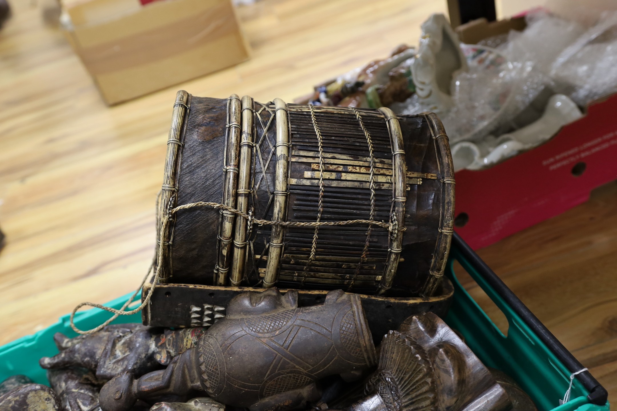 A group of African / Indian wood carvings, masks, etc.